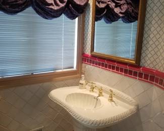 Pedestal sink; mirror