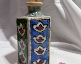 Person 5 Sided Ceramic Bottle