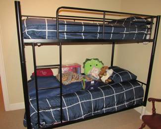 Two sets of metal bunk beds