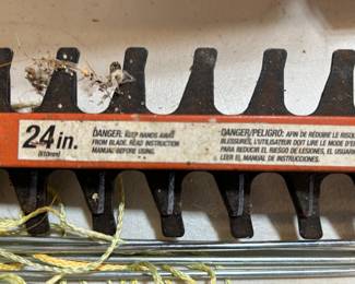 #234 Black and Decker 24" cordless trimmer hedge trimmer battery and charger $25.00