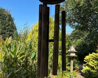 #73 metal and wood wind chimes 56"long $150.00