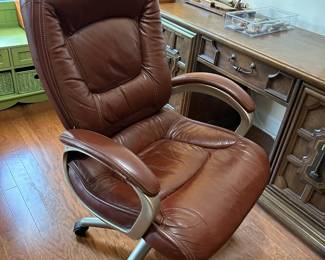 #40 Lane faux leather chair, adjustable, brown $40.00