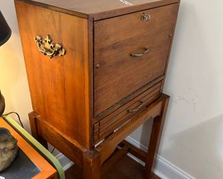 #45 liquor cabinet with stand, 1 drawer, 1 door with key 22x20x42 $100.00