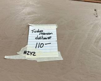 #242 Tudor mansion dollhouse $110.00