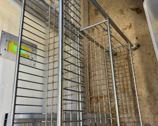 #229 Thin metal rolling cart (as-is rusted) 26x8x42 $20.00
