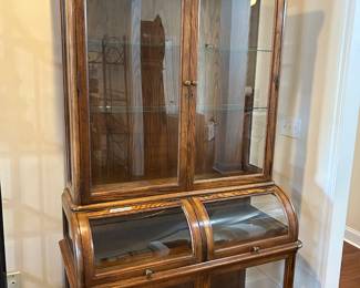#16 Jasper Furniture Lit Oak Curved front cabinet china cabinet, 6 doors 4 shelves, wood 43x19x82 $300.00