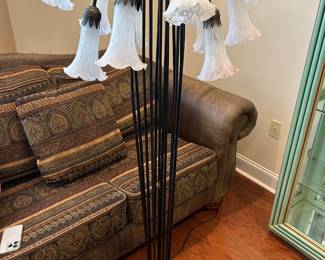#24 metal and glass, 12 lily. floor lamp 60" tall $150.00