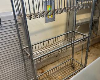 #229 Thin metal rolling cart (as-is rusted) 26x8x42 $20.00