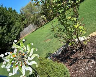 #80 metal flower yard art 31" long $35.00