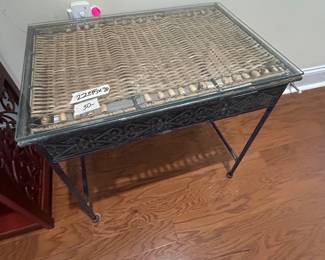 #90 Wicker and metal end table with a glass top 22x15x20 $30.00