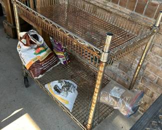 #66 metal mesh rolling cart 36x18x36 as is rust $25.00