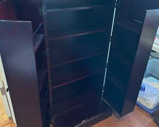 #52 dark wood media cabinet 25x14x48 $50.00