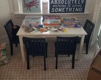 Child's play tyable & 4 chairs; puzzles