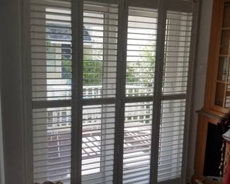 Plantation shutters for sliding glass doors