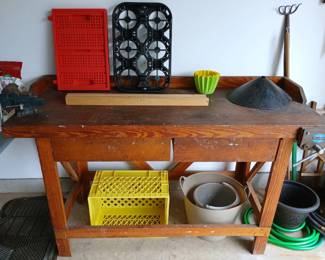 Solid wood workbench with two built in vises.