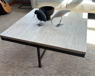 Square travertine and metal coffee table.