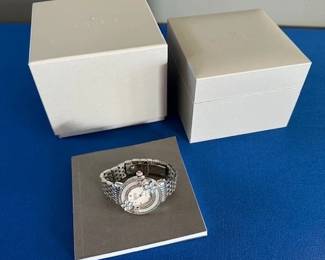 Michele Cloette Fleur Watch with crystal floral accents and mother of pearl dial.