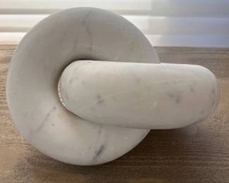 White marble knot sculpture.