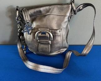 Mckowsky B. crossbody handbag with key chain.