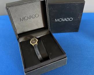 Movado Black and Gold Ladies watch.