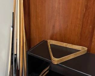 Pool cues and accessories.
