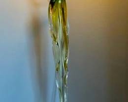 Hand-blown art glass sculpture featuring a twisted jalapeno with shades of green, amber, and clear glass, signed by artist