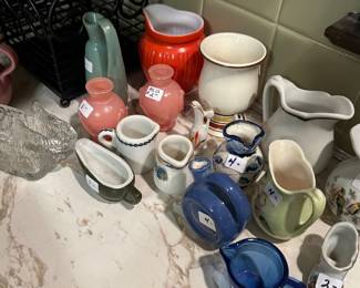 COLLECTION OF CREAM PITCHERS