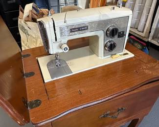 Kenmore sewing machine and cabinet