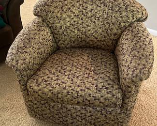 (2) matching upholstered swivel rocking chairs....