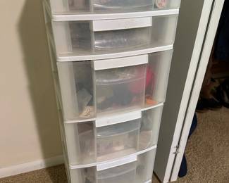 Storage filled with sewing supplies