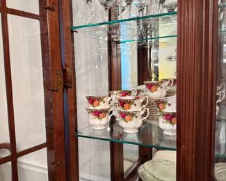 Inside the formal lighted China cabinet