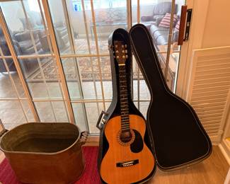 Copper wash tub and Vintage guitar.