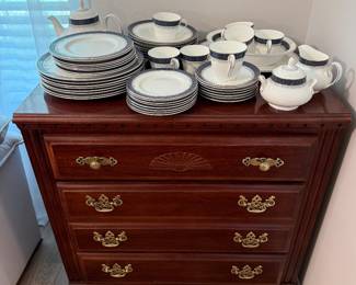 Set of Sherbrooke Royal Doulton dishes on nice chest