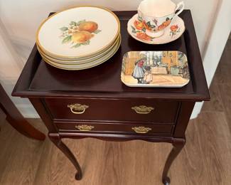 One of a pair of drawered tea tables, pretty dishes and vintage tray.
