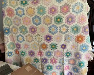 Gorgeous quilt in Grandmother’s Flower Garden pattern 