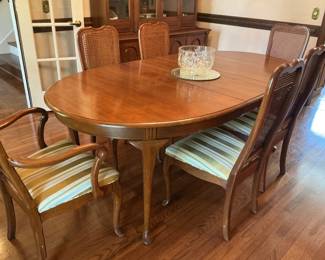 MCM dining table by Davis Cabinet Co.. has 2 leaves, table pad..