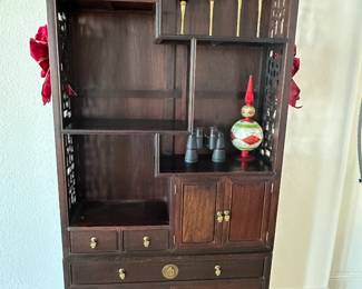 (Pending) Vintage Chinese Curio Cabinet featuring stepped open display shelves above carved lower storage doors