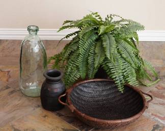 Lot #31 - Handwoven Rattan Market Basket, Decorative Glass Bottle, Artificial Fern Plant and Black Wood Vase