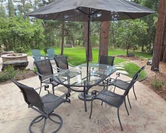 Lot #101 - Outdoor Patio Dining Set with Glass Table, Metal Frame Chairs, and Umbrella
