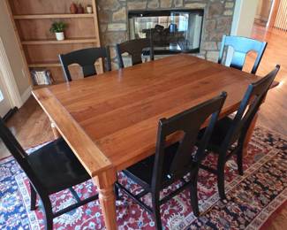 Lot #48 - Large Farmhouse-Style Wood Dining Table with Six Black Chairs