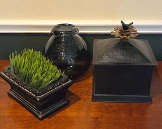 Lot #23 - Hammered Black Metal Box w/ Sculpted Wood Pinecone Finial + Black Wood Planter w/ Faux Grass & Smokey Gray Glass Vase
