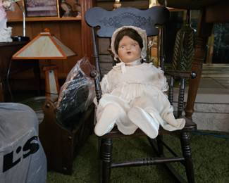 Doll and rocker over 100 years old