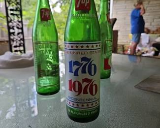 Commerative 7-UP bottles from 1976 with Liberty Bell on opposite side. 8 bottles