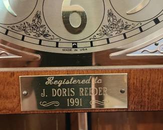 Beautiful circa 1991 Sligh Grandfather Clock, made in Holland, Michigan, USA. Features a gorgeous oak case with ornate carved detailing, moon phase dial, three brass weights and pendulum. In excellent working condition with a beautiful, rich chime. Registered in 1991. A wonderful statement piece with classic Sligh craftsmanship.