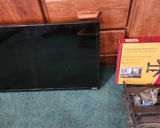 VIZIO FLAT-SCREEN TV WITH WALL MOUNT – VIZIO flat-screen television & wall-mounting hardware and mounting bracket.