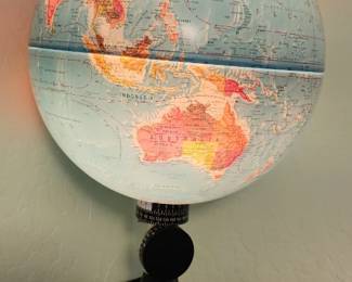ILLUMINATED WORLD GLOBE – Classic light-up tabletop world globe with decorative wood-tone base.