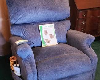 Pride Mobility Power Lift Recliner – Excellent Working Condition. Comfortable upholstered chair with powered lift/standing-assist and reclining functions. Includes wired hand control and original owner’s manual. Clean, comfortable and ready to use.