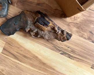 Fossilized handgun - I was told by a gun dealer because it is 100% inoperable that we can sell it 