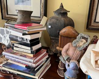 Here the books all have inscriptions and are first editions
