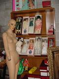 Some of the dozens of porcelain dolls available